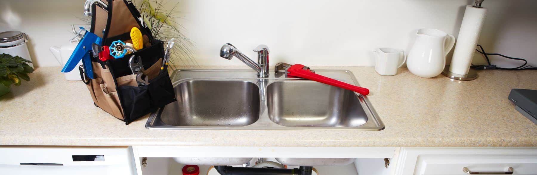 sink with plumbing tools on it